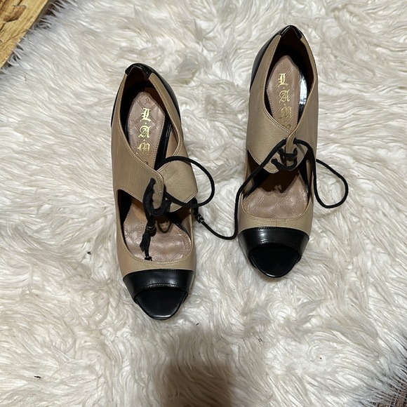 Black and tan color lock high heel shoes by LAMB Gwen Stefani.  Size 8. - Picture 2 of 9